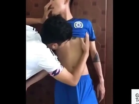 Two Asians wearing soccer uniform have sex. GayWiz.com