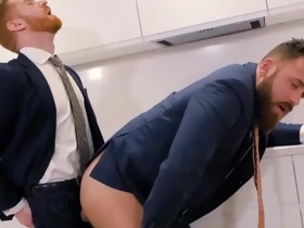 Redhead office dude in a suit fucks his colleague